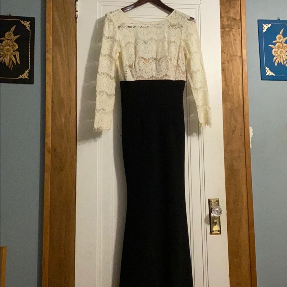 Black cream with lace top fishtail evening gown